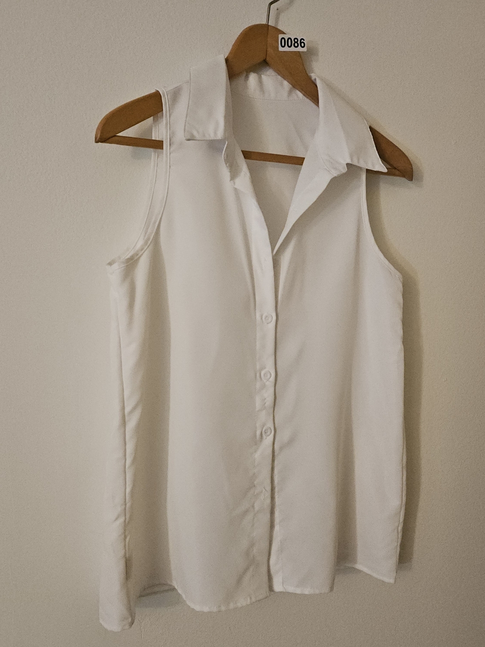 Sleeveless White Button-Down Shirt with Point Collar